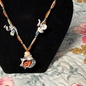 Beaded Necklace with Orange and Blue Pendant